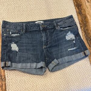 PAIGE Distressed Dark Blue Jean Shorts